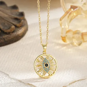 Close-up of rotating gold-plated Turkish Evil Eye pendant necklace with blue stones
