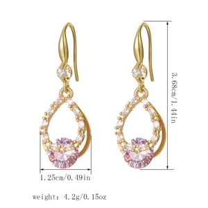 Macro detail view of gold-plated pink zircon drop earrings showing dimensions and weight