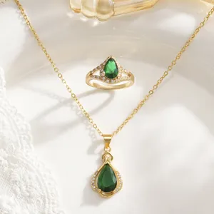 Elegant gold-plated necklace and ring jewelry set featuring teardrop green stones