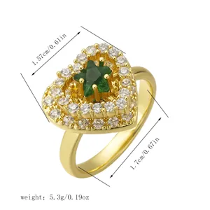 Detailed dimension view of gold heart ring with green star center