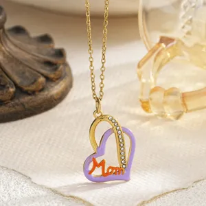 Detail view of heart necklace with purple enamel and orange Mom charm for Mothers Day