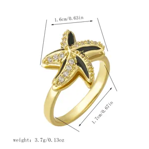 Detailed product view of a gold starfish spinning ring featuring dimensions and weight markers