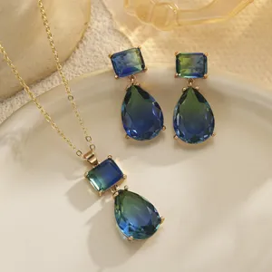 Detailed view of French vintage gradient blue-green gemstone necklace and earring set