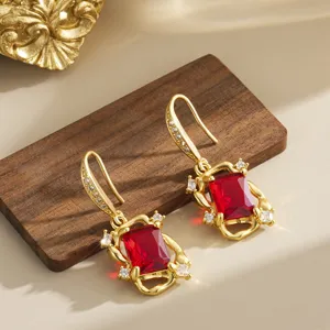 Detailed view of vintage neo-Chinese style earrings with red crystals and gold frames