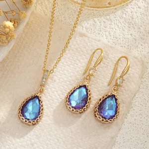 Teardrop blue crystal necklace and earrings set with gold-plated accents for brides