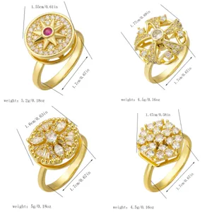 Detailed view of four elegant gold-plated rotating fidget rings with zircon stones