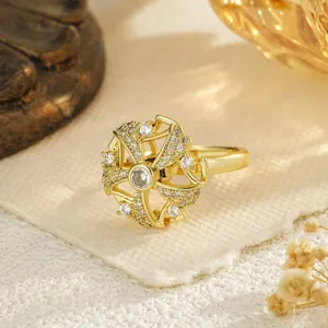 Gold-plated spinning fidget ring for women featuring sparkling cubic zirconia stones