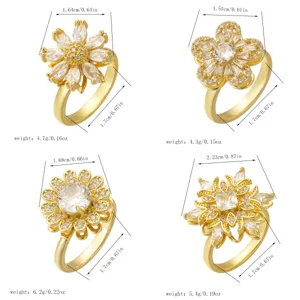 Vue détaillée de quatre bagues fleurs en zircon avec mesures de taille et de poids