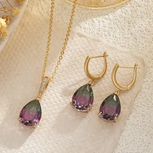 Macro shot of French retro style waterdrop gradient gemstone necklace and earring set