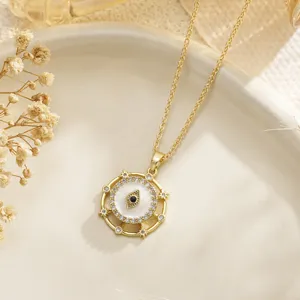 Elegant gold-plated rotating Evil Eye necklace with crystal-inlaid protective pendant