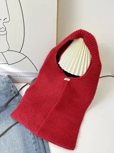 Detailed view of a red large capacity knitted tote bag showing its rich woven texture