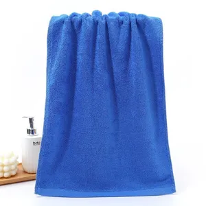 Premium royal blue cotton towel with soft absorbent texture for professional spa or home use.