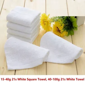 Soft white pure cotton towels and square cloths for hotel and kitchen bathroom use.
