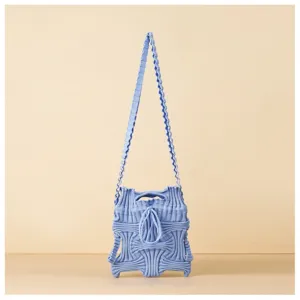 Close-up of blue knitted pleated mini crossbody bag with unique textured pattern