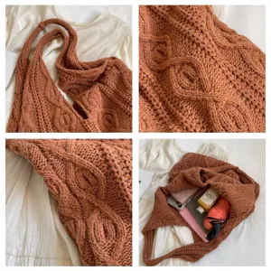 Detail view of a vintage brown knitted tote bag showing its texture and large capacity items.
