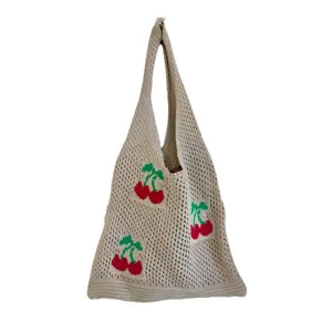 Large capacity beige knitted tote bag featuring a vibrant red cherry pattern crochet