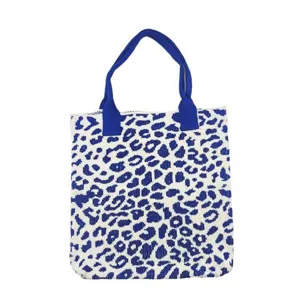 Close-up view of a stylish blue and white leopard print knitted tote bag for daily use