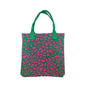 Vibrant pink leopard print knitted tote bag with green background and double handles