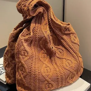 Vintage orange cable-knit shoulder tote bag with handmade texture and slouchy design