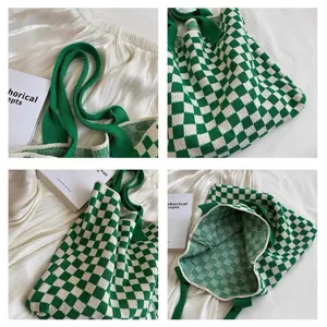 Detail view of a green and white checkered knit tote bag showing the interior and large capacity