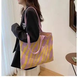 Fashionable large capacity purple and yellow zebra pattern knit tote bag carried on shoulder