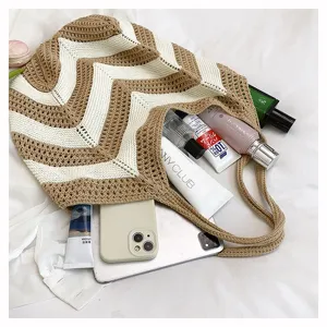 Large capacity bohemian crochet shoulder bag showing interior with daily essentials