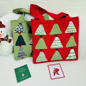 High-quality detail of festive Christmas tree patterned knitted tote bags in red and green colors