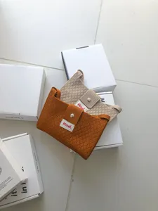 Knitted crossbody phone bag casual small square bag for women summer fashion use.