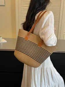 Large capacity straw tote bag with black stripes and brown leather straps for summer beach
