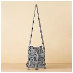 Detailed view of a stylish grey knitted crossbody bag featuring unique pleated woven texture