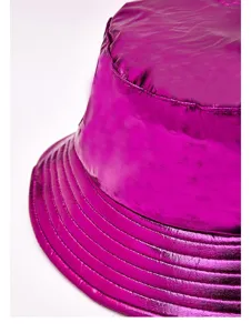 Detailed macro shot of a metallic pink patent leather bucket hat showing shiny surface