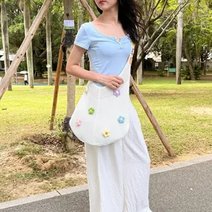 Casual crochet shoulder bag with floral appliques, large capacity knitted tote for women travel.