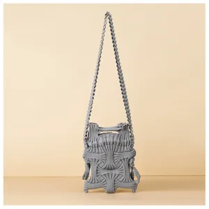 Grey niche pleated knitted mini crossbody bag for phone with sculptural ribbed texture
