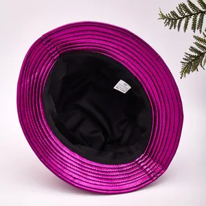 Shiny metallic magenta patent leather bucket hat featuring a foldable sun protection design