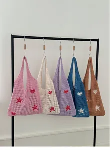 Collection of colorful crochet knit tote bags with star patterns hanging on a rack
