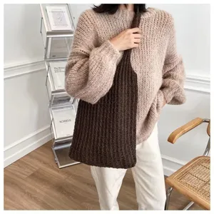 Versatile large capacity brown crochet knit tote bag worn by model for casual style