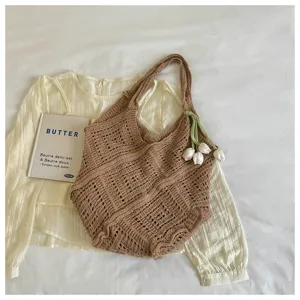 Bohemian hollow-out crochet tote bag in brown with decorative tulip charm
