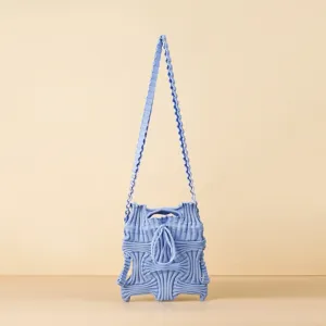Modern blue pleated knitted crossbody bag with unique ribbed texture and long strap
