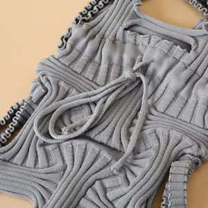Grey knitted pleated mini crossbody bag with unique woven ribbed texture detail