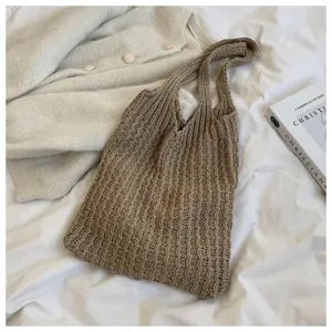 Cozy khaki knitted tote bag with textured rib pattern for summer vacation beach