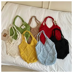 Detailed view of colorful bohemian crochet hollow beach tote bags in seven vibrant colors