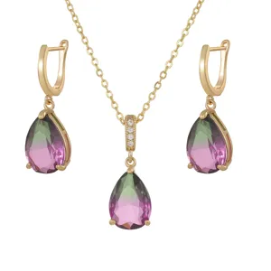 Elegant teardrop jewelry set with gradient tourmaline-colored gemstones and gold-plated chain.