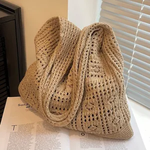 Sac à bandoulière en tricot rétro avec un élégant design en maille ajourée pour femme