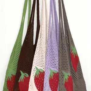 Set of eco-friendly knitted mesh tote bags with strawberry patterns in vibrant colors