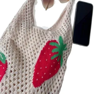Knitted mesh tote bag with vibrant red strawberry pattern and hollow-out design