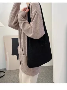 Vintage black hollow-out knitted shoulder bag with large capacity for daily casual use