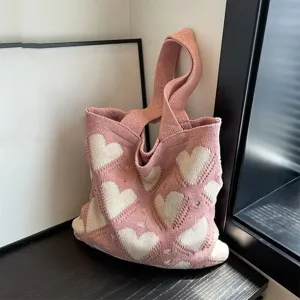 Große gestrickte Tragetasche mit rosa und weißen Herzmustern für den täglichen Gebrauch