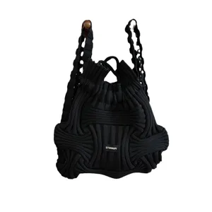 Unique niche designer black knitted woven backpack and convertible handbag for women's fashion