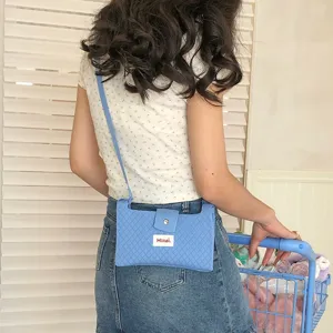 Macaron blue knitted crossbody phone bag for women, casual summer small shoulder bag.