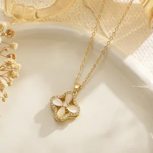 Detailed view of rotatable double-layer four-leaf clover flower pendant necklace
